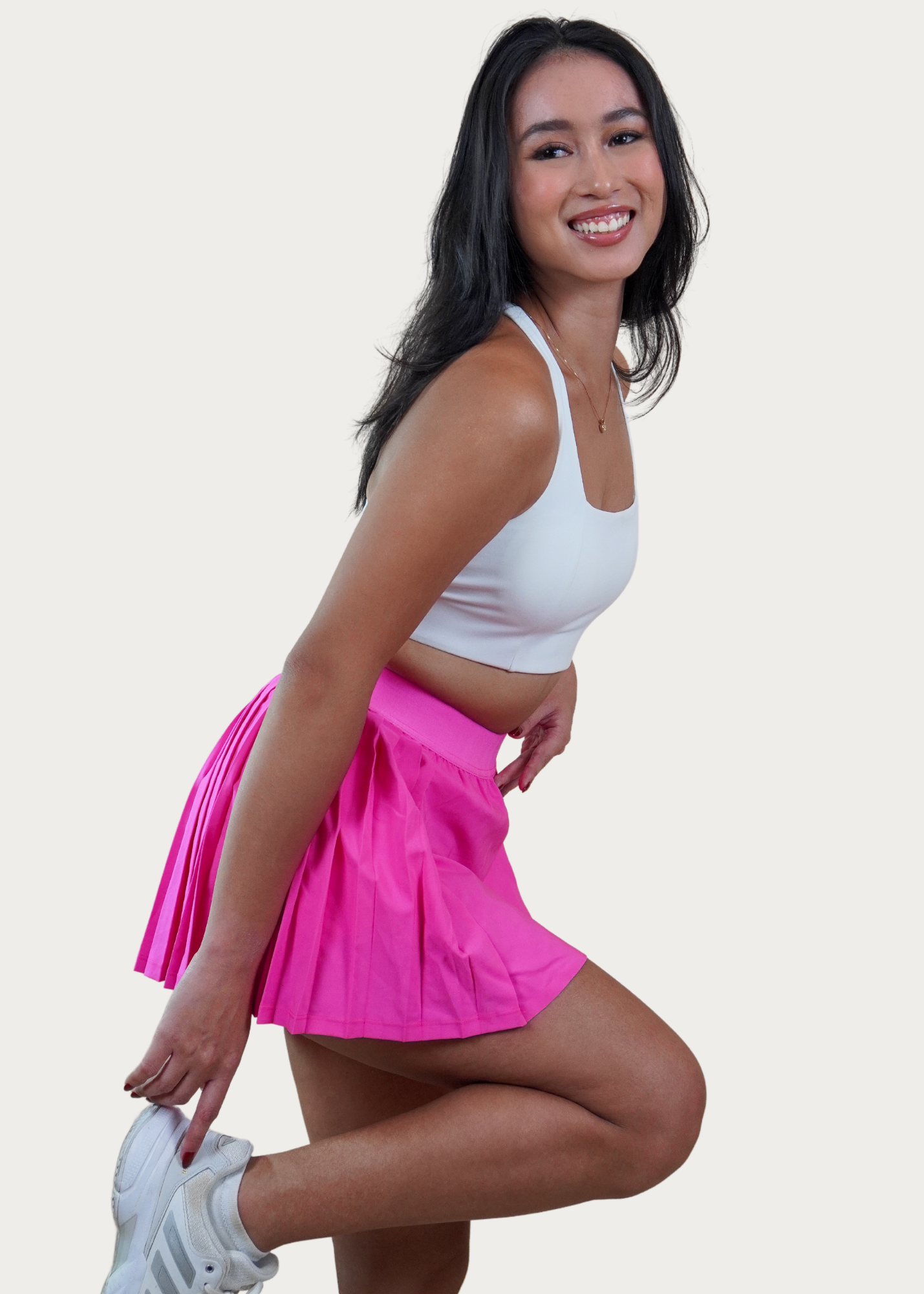 VARSITY SKIRT IN ELECTRIC PINK